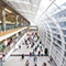 Airport with people walking around, using indoor GIS to navigate to their destination
