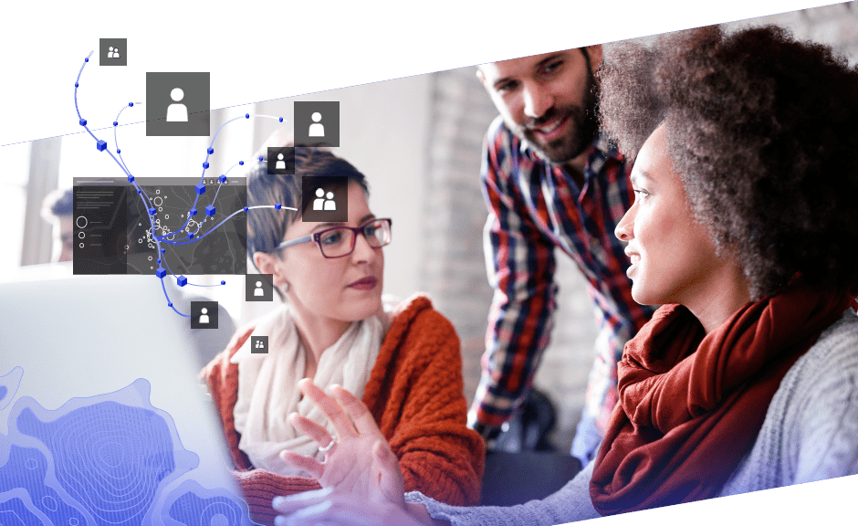 Two women and a man collaborate around a computer and several people icons connected by lines