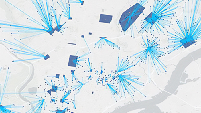 Mappa grigia con quadrati blu che rappresentano gli edifici e linee blu starburst che esplodono con cerchi alle loro estremità