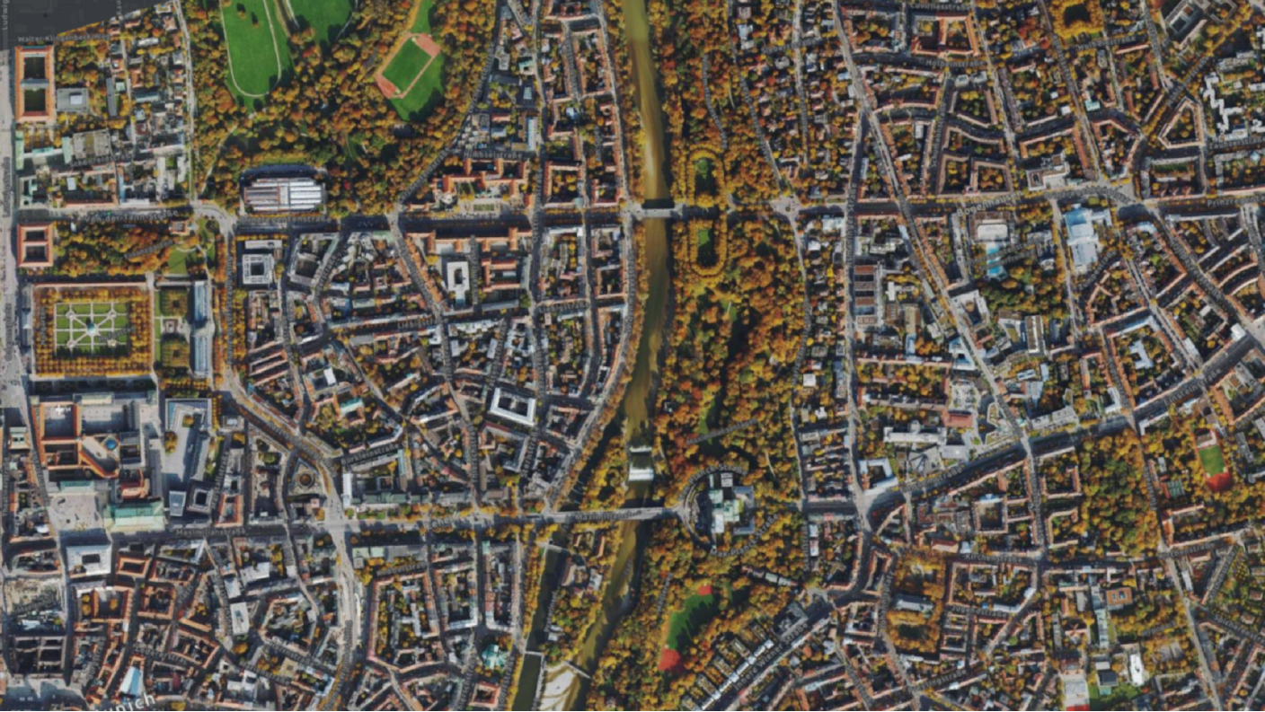 Immagine ortomosaico della vista aerea di una città con edifici, vegetazione e strade
