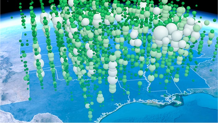 A 3D data visualization showcasing green and white spheres distributed over a geographic map.