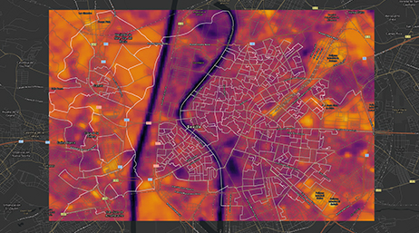 Mappa in scala di grigi sotto un'altra mappa con diverse aree ombreggiate in viola, arancione e rosa