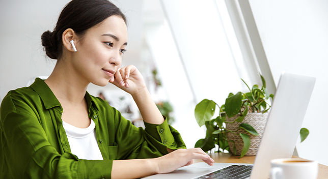 Woman looking at a laptop