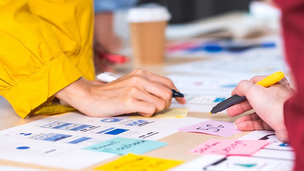 Two people working on a project